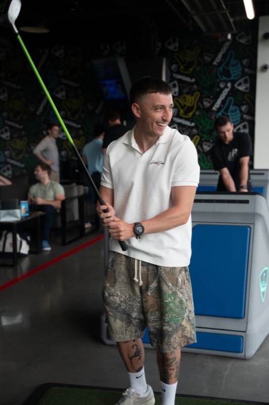 A laugh mid swing