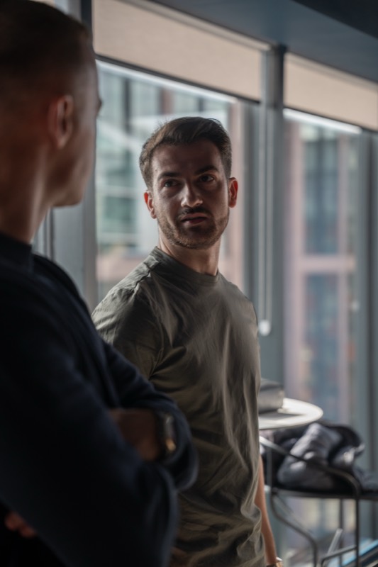 A conversation by the window